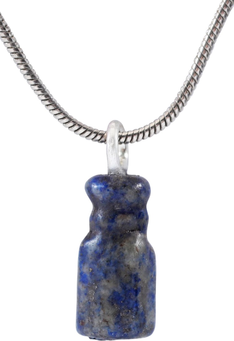 VIKING LAPIS LAZULI PENDANT NECKLACE, C.850-1000 AD: Natural gemstone meticulously worked and polished to a hexagonal form with a ringed neck above. Originally part of an elaborate aegis or built-up necklace. Ribbed cylindrical form with bun-formed ends