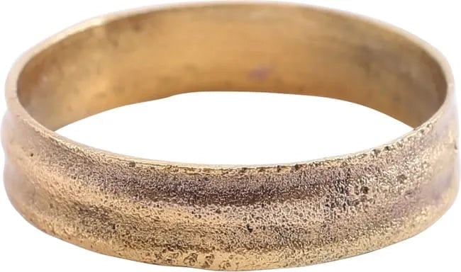 FINE VIKING WEDDING RING, SIZE 8 1/4, 850-1050 AD.: Gilt bronze, size 8 1/4, 4.5mm width. Raised stippled line borders flanking recessed bands with a raised rounded medial resulting in a five band effect. Professionally refurbished with the 24karat gol