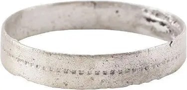 FINE VIKING WEDDING RING, 850-1050 AD, SIZE 8 1/2: Silvered bronze, size 8 1/2. Hand fashioned, 3.7mm width, near-flat section with a central hand stippled band. Surface textured from burial. Professionally refurbished with the silver surface restored
