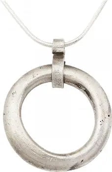 VIKING PROTECTIVE BROOCH NECKLACE 10th-11th CENTURY AD.: Worn in numbers on the surface of the jerkin, these small metal brooches provided a measure of protection against sword cuts and, in fact, were a form of armor. See current Public Television programmi