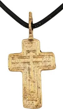 FINE EASTERN EUROPEAN CHRISTIAN CROSS: 17th-18th century, Orthodox rite. Gilt bronze, just under 1 1/2" height plus the suspension loop. Relief decorated with raised edges and a vacant cross with five short transverse bars to the center be