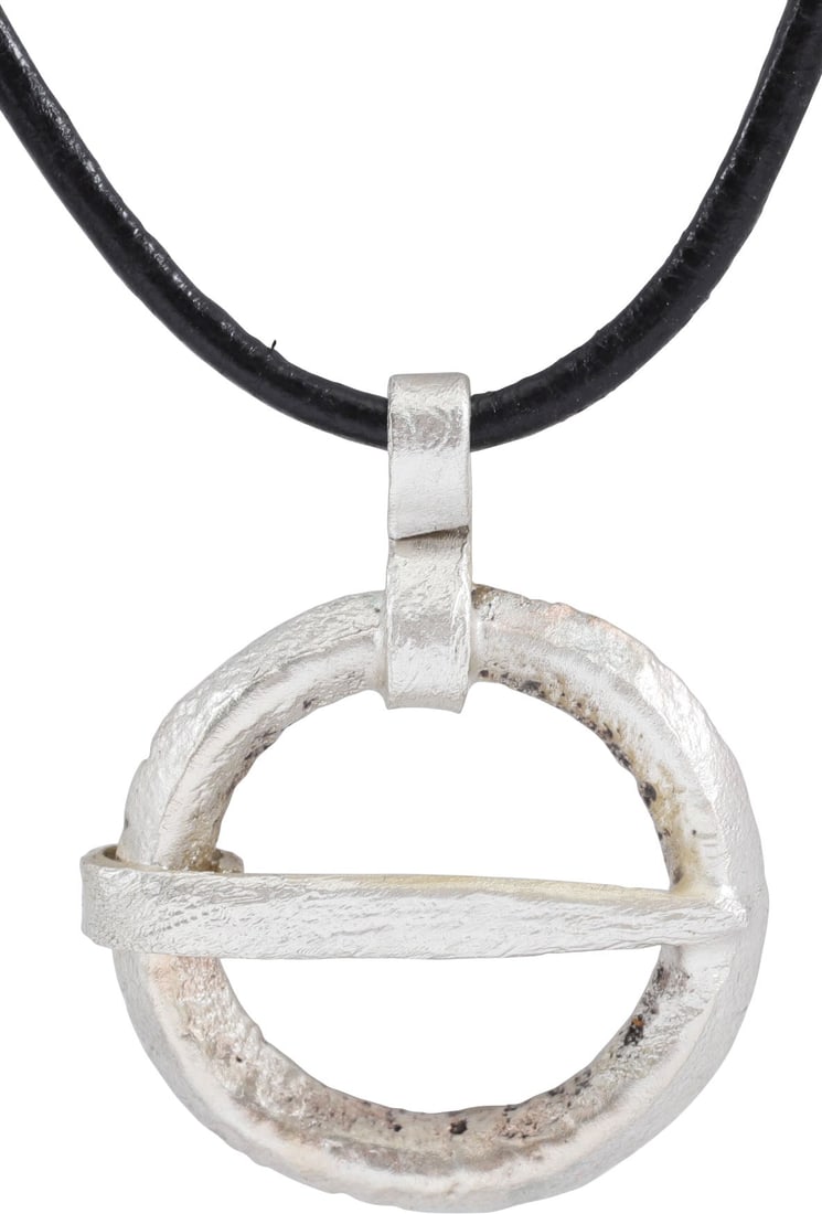 VIKING PROTECTIVE BROOCH NECKLACE 9TH-11TH CENTURY AD: Worn in numbers on the surface of the jerkin, these small metal brooches provided a measure of protection against sword cuts and, in fact, were a form of armor. See current Public Television programmi