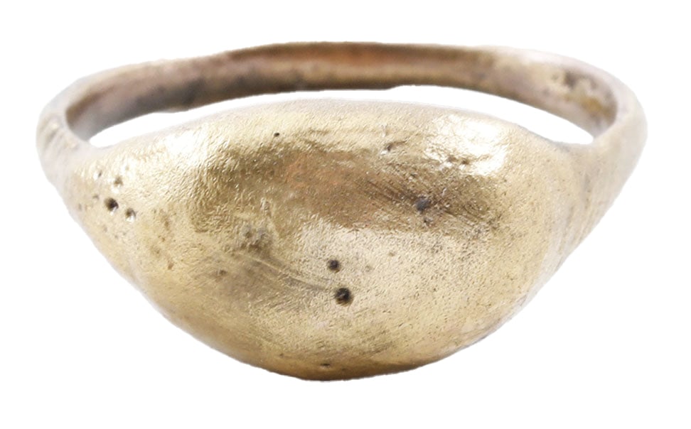 VIKING WARRIOR'S PINKY RING, SIZE 9 1/4: Gilt bronze, size 9 1/4 with 1.9 low rounded band flared to the shoulders. Raised oval shaped bezel of high domed section. Surface textured from burial. Professionally refurbished with the 24karat gol