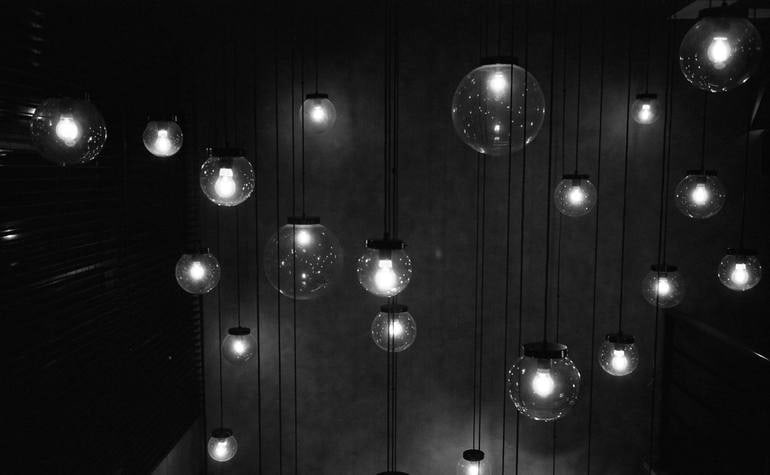 Bar Lights, Barcelona, Spain - Silver Gelatin Photograph: Title: Bar Lights, Barcelona, Spain - Silver Gelatin Photograph Description: Bar Lights, Barcelona, Spain - Silver Gelatin Photograph - Limited Edition of 10 Paul Cooklin United Kingdom Photography, B