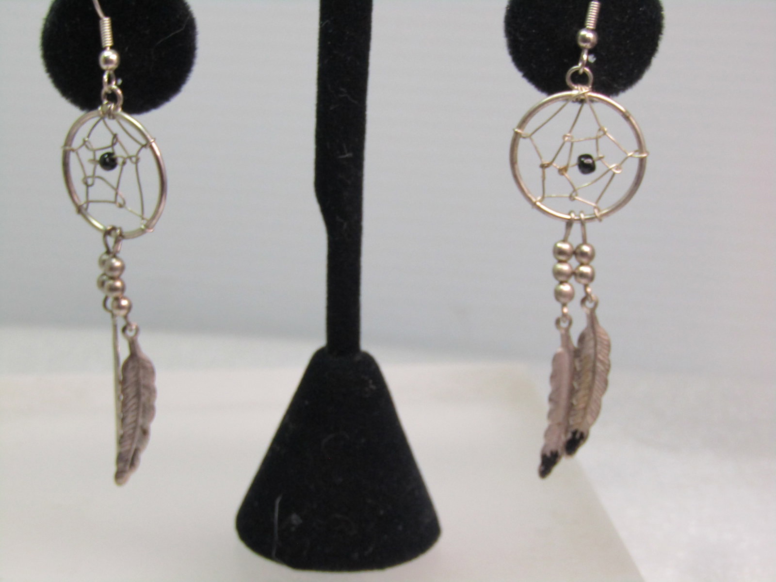 Vintage Southwestern Dreamcatcher Earrngs, Pierced, 1980's: Title: Vintage Southwestern Dreamcatcher Earrngs, Pierced, 1980's Description: Vintage Dreamcatcher Earrngs, Pierced, Southwestern, 1980's. Silver tone with a dreamcatcher and a single black glass