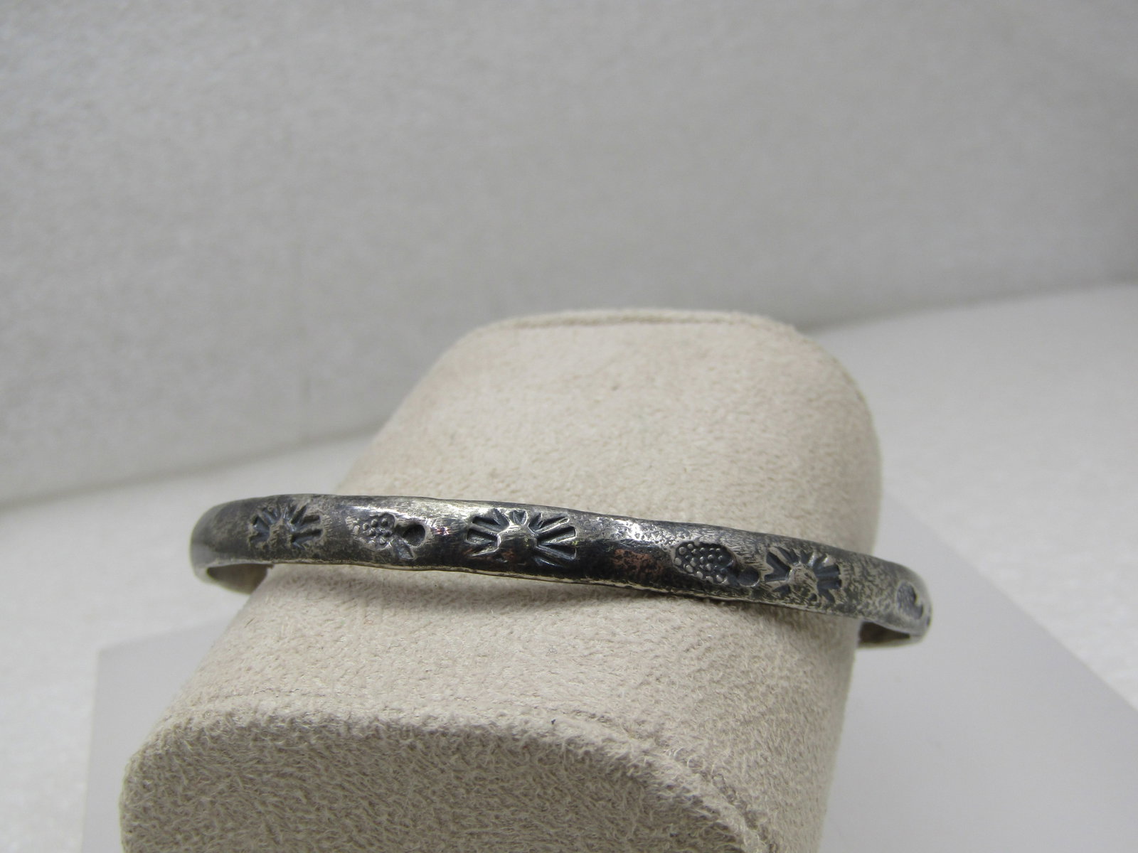 Vintage Stamped Mexican Bangle Bracelet, 8", Silver Tone: Title: Vintage Stamped Mexican Bangle Bracelet, 8", Silver Tone Description: Vintage Stamped Mexican Bangle Bracelet, 8", Silver Tone. It is appxx. 5.5mm wide with a mix of stamped Aztec stamped marki