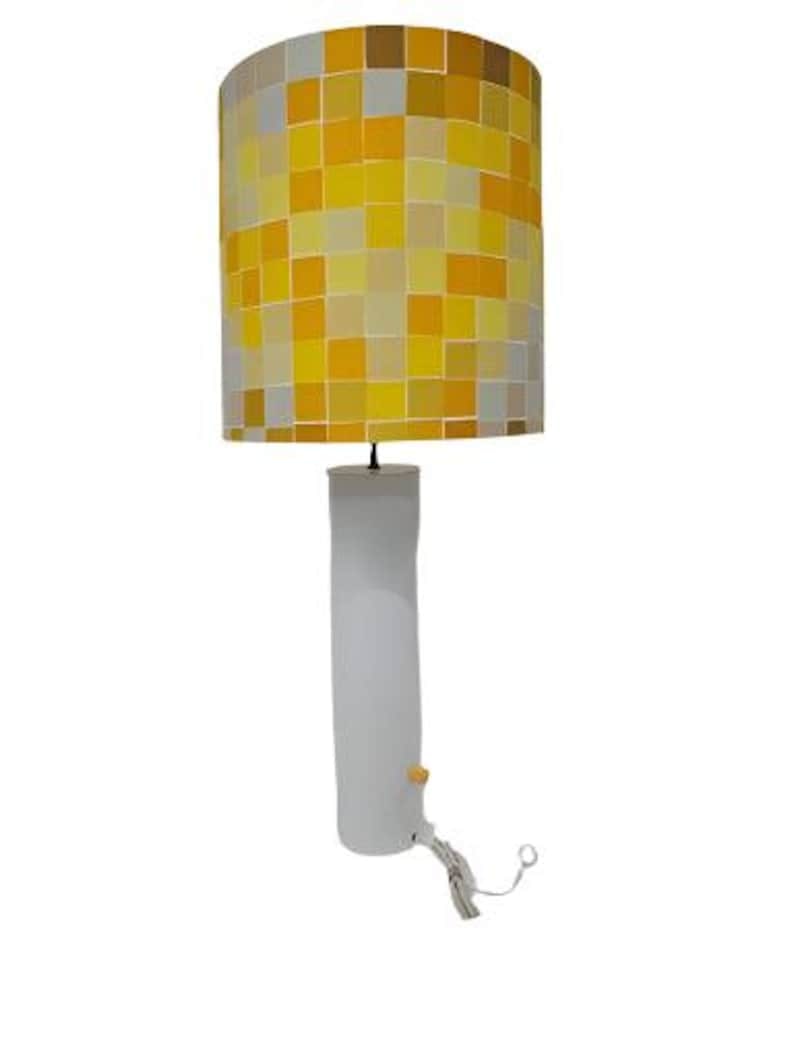 MCM Italian Retro Table Lamp with Yellow Shade: Title: MCM Italian Retro Table Lamp with Yellow Shade Description: .Mid Century Modern Italian Tall White Metal Cylinder Retro Table Lamp with Multi Color Cube Patterned Shade Vintage 70's Modern Tall