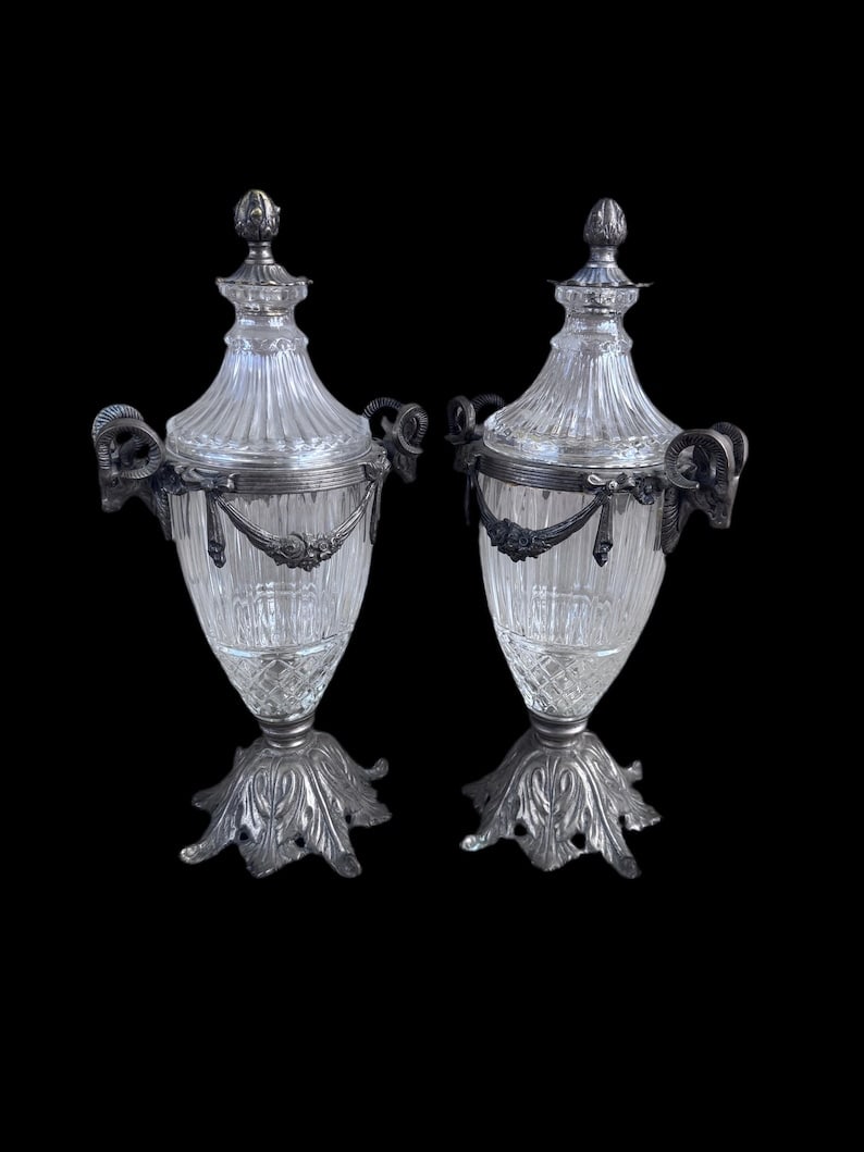 Antique French Cassettes Urns with Ram's Head Handles - Pair: Title: Antique French Cassettes Urns with Ram's Head Handles - Pair Description: .Antique French Crystal and Bronze Cassettes Urns with Lids with Ram's Head Handles - Pair Absolutely stunning ornate b