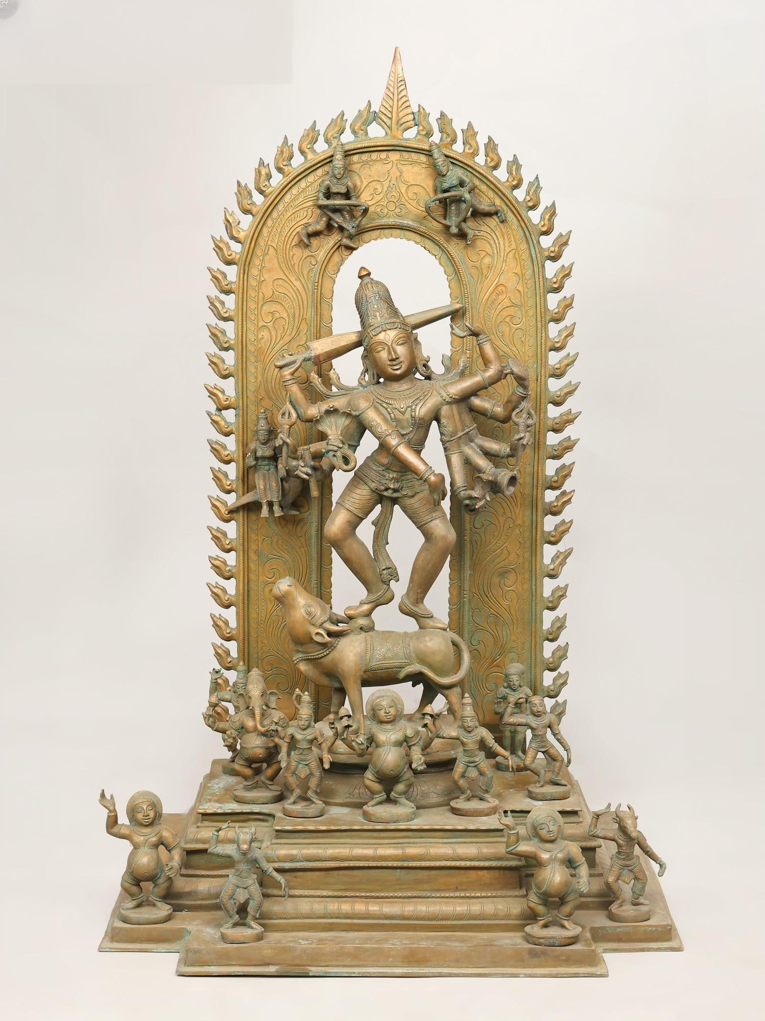 Dashabhuja Rishabha Thandavamoorthy (Ten-Armed Dancing Shiva on Nandi) | Madhuchista Vidhana: Title: Dashabhuja Rishabha Thandavamoorthy (Ten-Armed Dancing Shiva on Nandi) | Madhuchista Vidhana (Lost-Wax) | Panchaloha Bronze from Swamimalai Description: Reserve: $13,967.00 Shipping: Domestic: