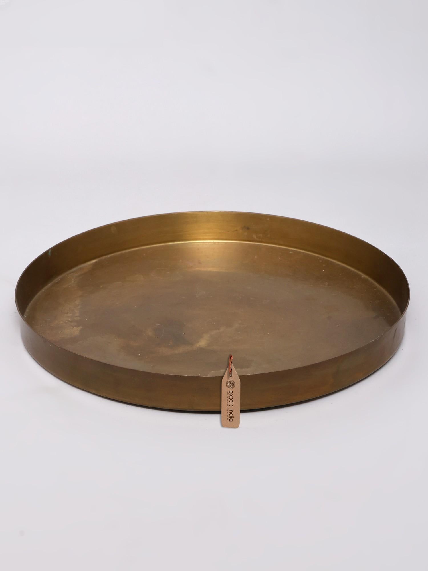 12" Ritual Thali in Brass: Title: 12" Ritual Thali in Brass Reserve: $119.00 Shipping: Domestic: Shipping rates are determined by destination International: Foreign shipping rates are determined by destination. International