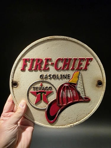 Cast Iron Round Texaco Fire Chief Gas Oil Sign Plaque: 9 1/2" round 1/4" thick Such a neat reproduction cast iron plaque/sign. This sign is all solid cast iron. Hand painted, wonderful signs of wear and distress. Hard to tell its age! Reserve: $25.00 Ship