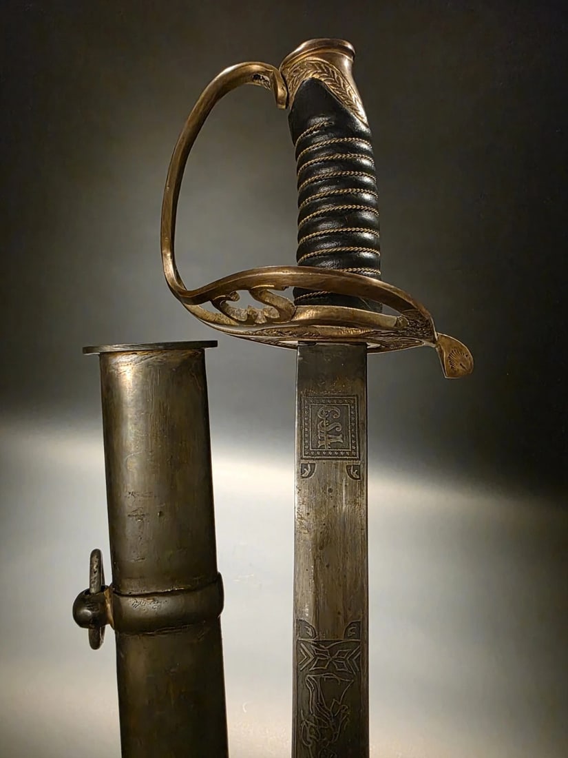 40" Antique-Style 1850 Confederate Civil War Sword: 40" sword,..41 3/4" Long with steel scabbard Aged reproduction of an 1850 Confederate officer’s Civil War sword featuring a brass hilt, leather-wrapped handle, and carbon steel blade. Complete w
