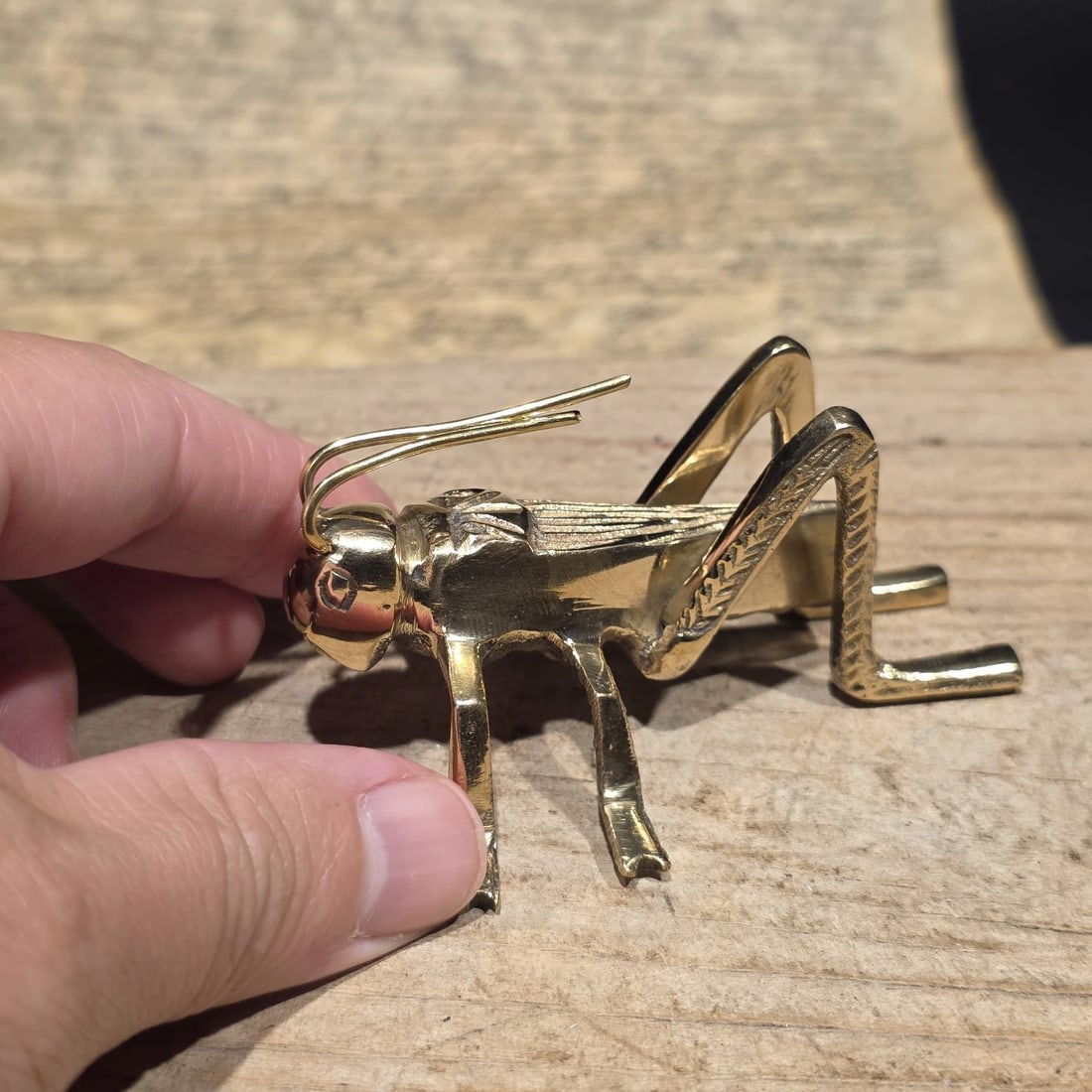 3" Brass Fireplace Good Luck Hearth Cricket: 3 1/2" Long 1 1/8" Wide 2" Hide Wonderful antique style brass hearth cricket. Many times found on the hearth crickets are said to bring good luck and fortune to ones house and home. Nice detail and