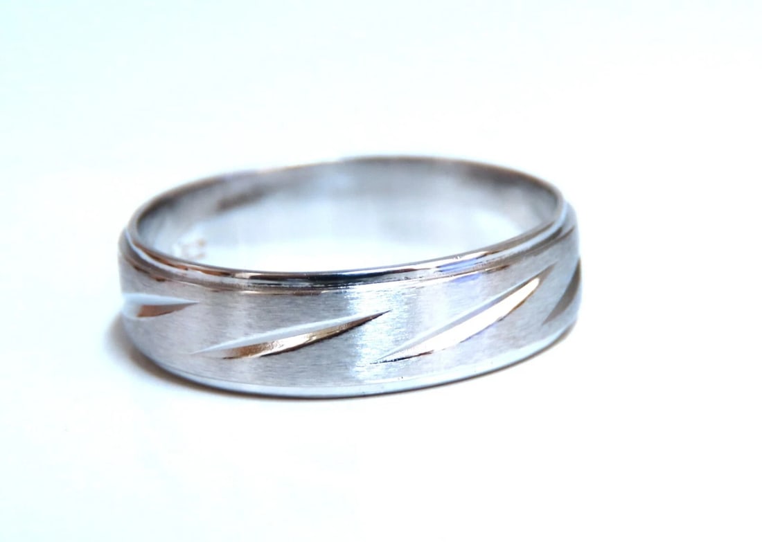 5.7mm Classic Band 14kt gold Bright Cut 9.5 *v: Title: 5.7mm Classic Band 14kt gold Bright Cut 9.5 *v Description: Eternity bright cut band. Keepsake brand Hand-graved design 5.5mm wide 1.2 mm depth 14 karat white gold 4.5 g Size 9.5 ....*.