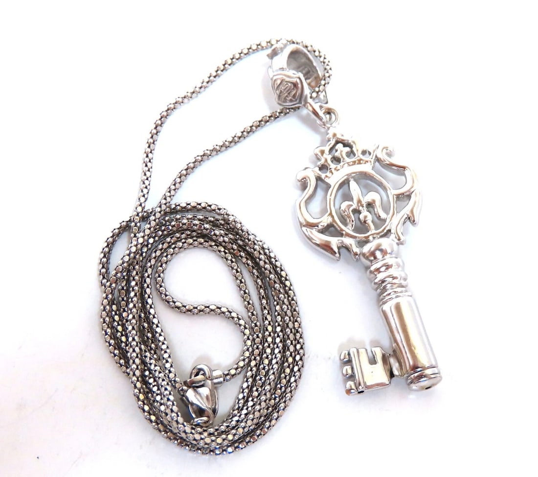 14kt Gold Key charm necklace **: Title: 14kt Gold Key charm necklace ** Description: 14 karat yellow gold key necklace 9 g total weight 45 x 18mm key 24 inch ....*. Reserve: $1,674.00 Shipping: Domestic: Free shipping to
