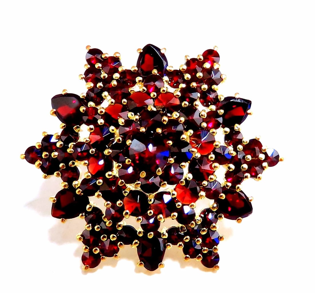 Cosmopolitan 14kt Gold Garnet Pin 14kt**: Title: Cosmopolitan 14kt Gold Garnet Pin 14kt** Description: Cosmopolitan Deco Cluster Pin Very Well Made 3.50ct natural Garnets 30 x 26mm 14kt. yellow gold 9.2 Grams. ....*. Reserve: $837.00 Shipping
