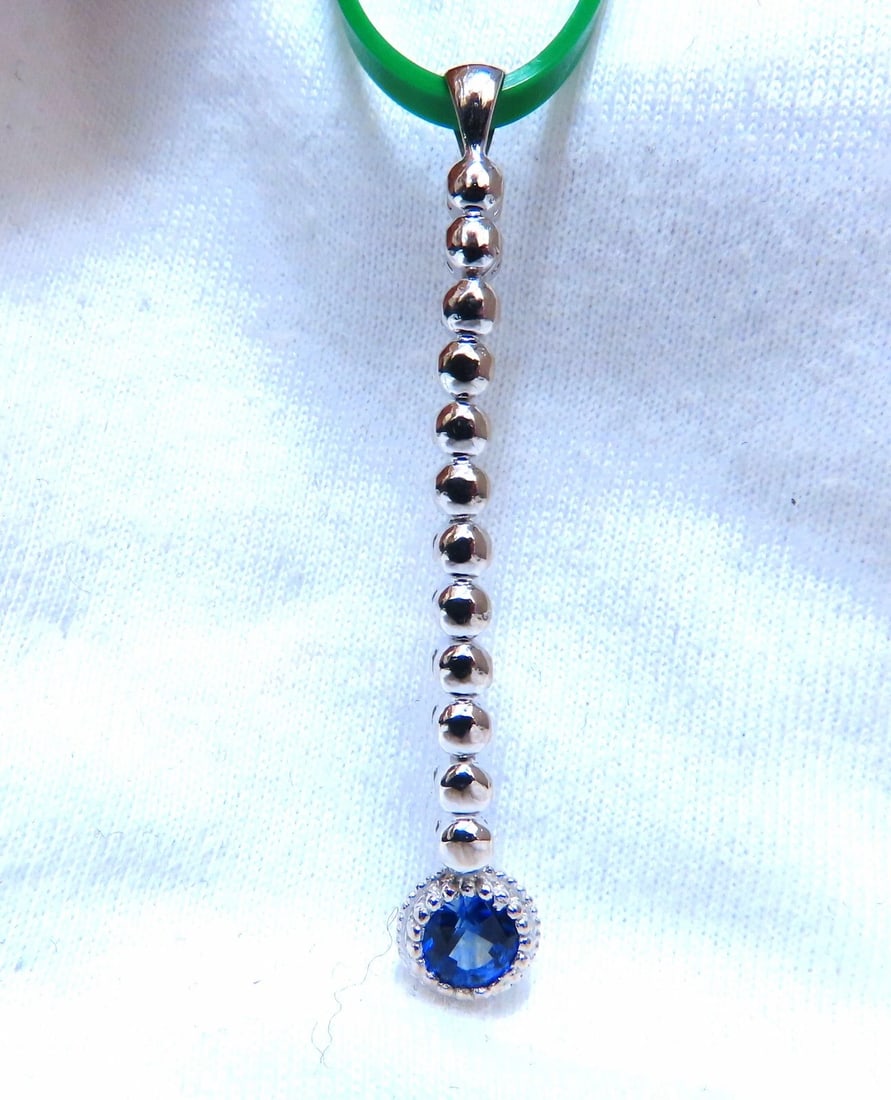 .65ct Natural Blue Sapphire Diamonds Pendant 14kt **: Title: .65ct Natural Blue Sapphire Diamonds Pendant 14kt ** Description: .65ct. Natural Sapphire Pendant Clean clarity & transparent Brilliant Round cut 3.7mm Diameter Overall Measurement: 1.8 inch le