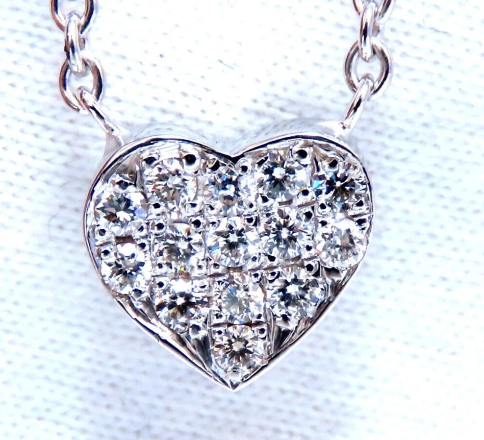.52ct Bead Set Heart Natural diamonds necklace 14 karat**: Title: .52ct Bead Set Heart Natural diamonds necklace 14 karat** Description: Loves & Sparkles. .52ct. Natural diamonds heart necklace. Full cut and Brilliant G-color, Vs-2 clarity Pendant Measurement