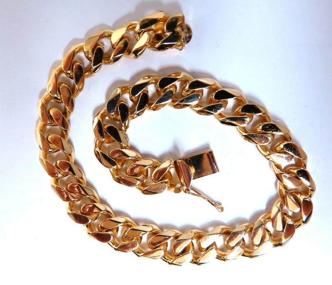 Modified Cuban Link Bracelet 14kt 39 Grams 8 Inch**: Title: Modified Cuban Link Bracelet 14kt 39 Grams 8 Inch** Description: Cuban Link Bracelet Durable, Well Made 14kt. yellow gold 39.3 Grams. 8.3mm wide 8 inch long Lobster clasp. All Items come with a