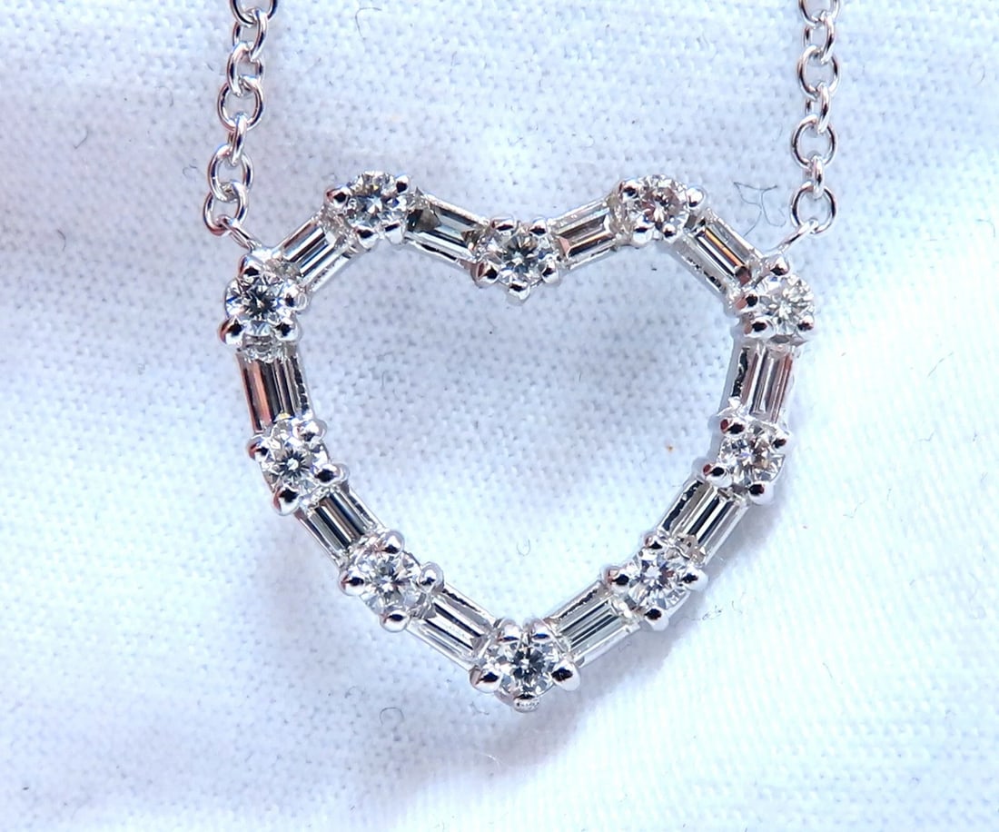 1.05ct Natural Baguette & Rounds Diamonds Heart Necklace 14kt**: Title: 1.05ct Natural Baguette & Rounds Diamonds Heart Necklace 14kt** Description: MAGNIFICENT JEWELS 1.05ct. Natural Diamonds heart pendant G-color / Vs-2 clarity 10 round diamonds 10 baguettes