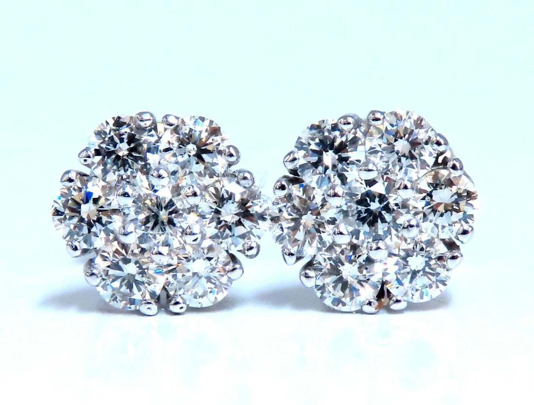 2ct Natural Diamonds Cluster Earrings 14kt**: Title: 2ct Natural Diamonds Cluster Earrings 14kt** Description: Cluster & Halo Stud Earrings. 2cts of natural round diamonds: G-color, Vs-2 clarity. 14kt. white gold 3.4 grams. Earrings measure: .37