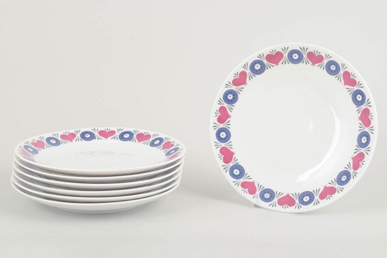 Marianne Westman for Rorstrand, Sweden. Set of six stoneware salad plates with floral motif. Approx.: Marianne Westman for Rorstrand. Set of 6 salad plates, Silja model, 1960s. Decorated with Westman's characteristic floral motif in blue and pink on a white ground. Made in Rorstrand's durable