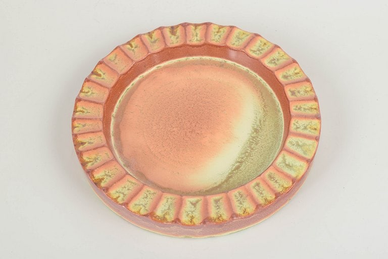 Hoganas, Sweden. Art Deco low circular ceramic dish with a relief rim. Approx. 1940s. - 2