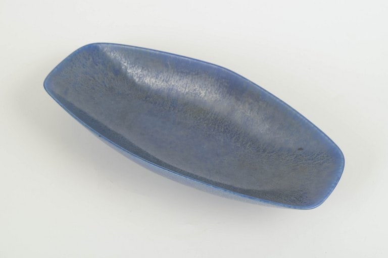 Carl-Harry Stalhane for Rorstrand, Sweden. Low stoneware bowl with a matte blue glaze. Mid-20th - 2
