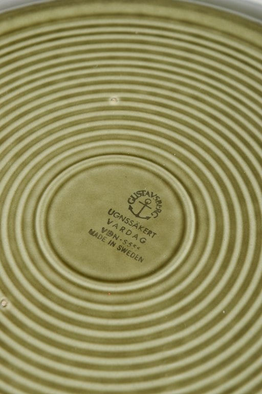 Stig Lindberg for Gustavsberg, Sweden. Set of four stoneware dinner plates with green glaze. approx. - 4