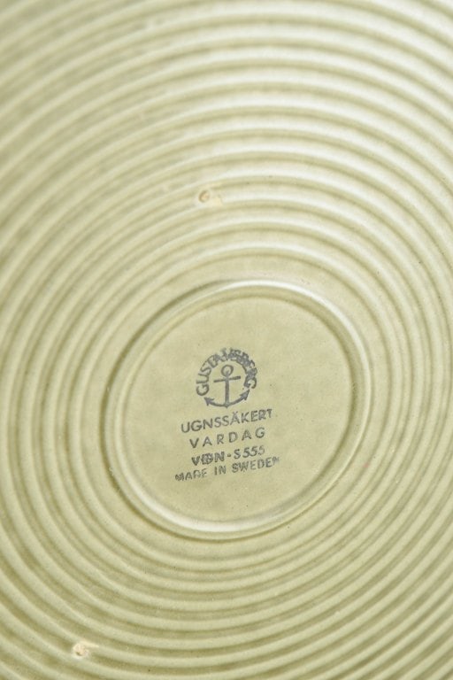 Stig Lindberg for Gustavsberg, Sweden. Set of four stoneware dinner plates with green glaze. approx. - 4