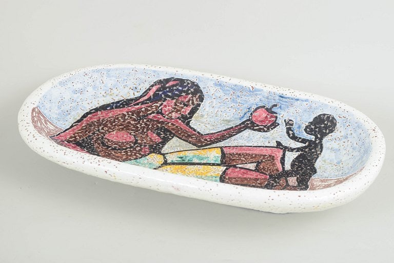 Erik Ploen, Norway. Monumental figurative stoneware wall relief with mother and child motif. Dated - 2