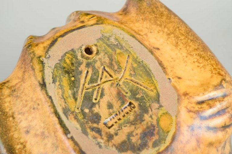 Karl Hansen Reistrup for Kahler, Denmark. Small stoneware figurine with uranium glaze. Approx. - 4