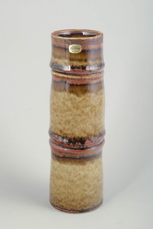 Olle Alberius for Rorstrand, Sweden. Tall, cylindrical stoneware vase in warm brown, amber, and (1 of 4)