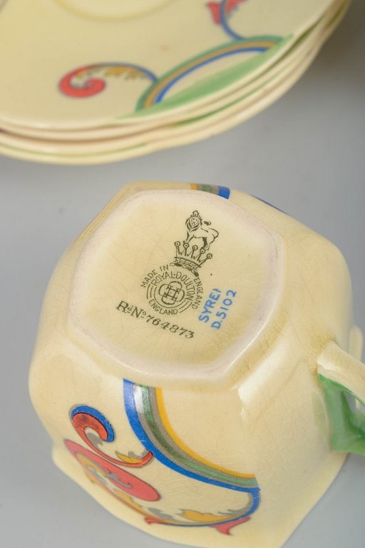 Clarice Cliff for Royal Doulton, England. Faience set of four coffee cups with saucers with - 5