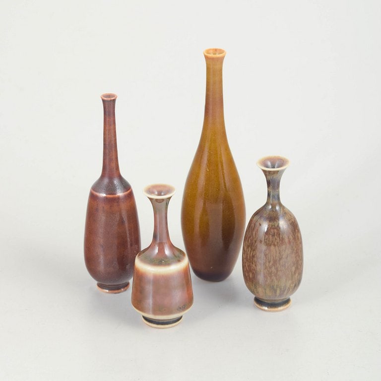 John Andersson for Hoganas, Sweden. Set of four miniature stoneware vases in earthy tones. Approx.: John Andersson for Hoganas, set of 4 miniatures vases. Small thrown stoneware vases with elegant, well-balanced silhouettes and expressive glazes in warm earthy tones. Characteristic of Hoganas studio
