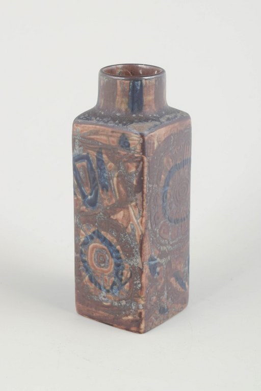 Nils Thorsson for Royal Copenhagen, Denmark. Stoneware vase in blue and brown tones. Approx.: Nils Thorsson for Royal Copenhagen. Vase, model 870/3258, 1970/80s. Rectangular stoneware vase with characteristic relief decoration in blue and brown hues from Thorsson's Baca series. The geometric