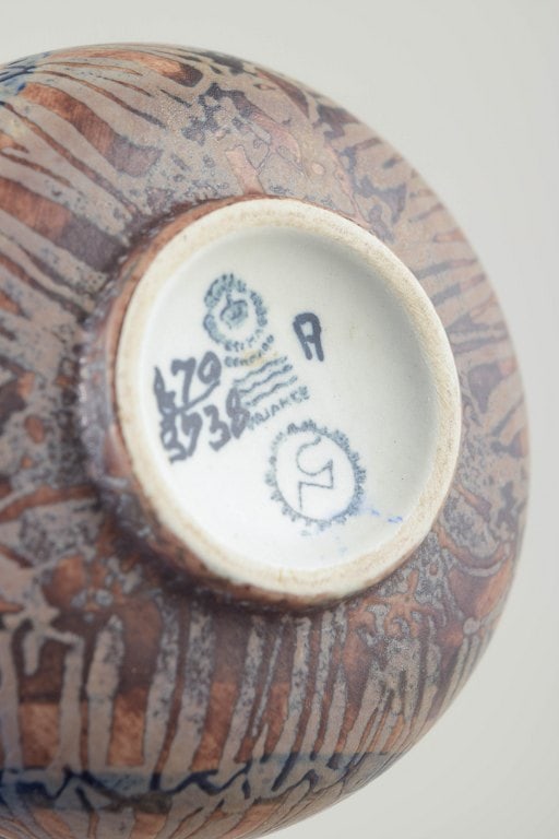 Nils Thorsson for Royal Copenhagen, Denmark. Stoneware bowl in blue, brown, and light tones. Approx. - 4