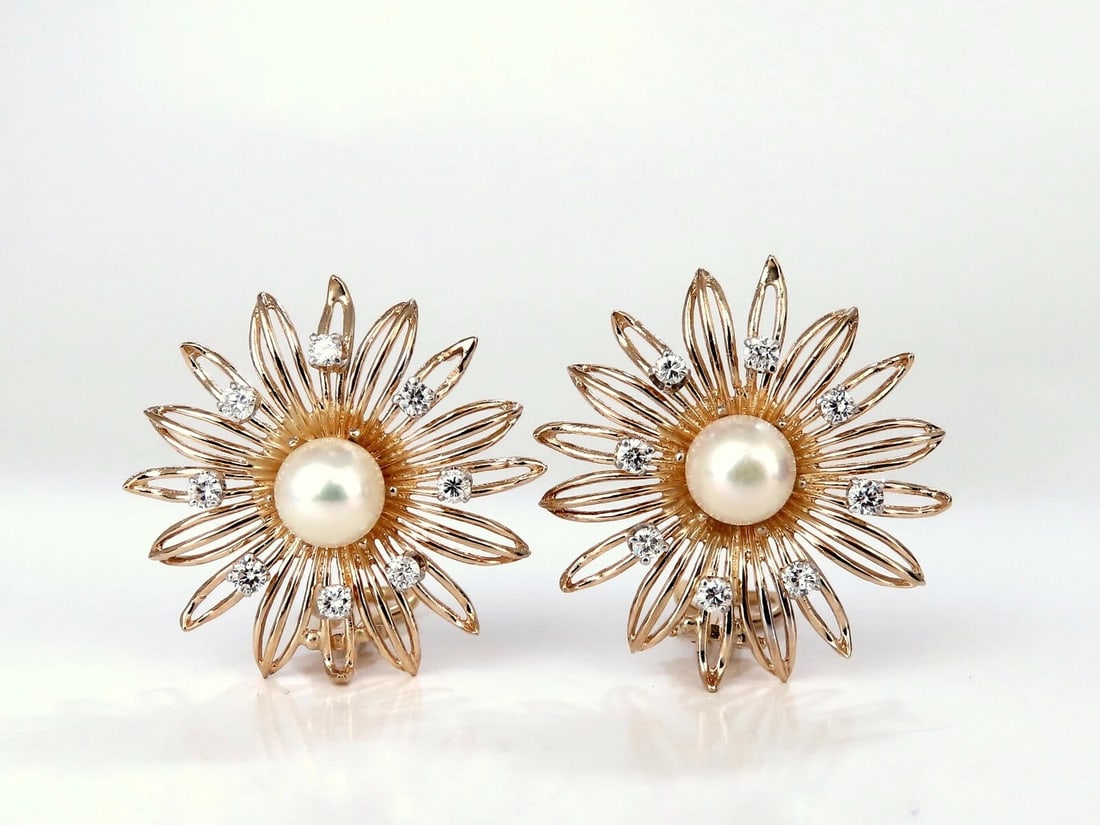 7.5mm South Seas Pearls 1ct Diamonds Sunburst Earrings 14kt Gold**: Title: 7.5mm South Seas Pearls 1ct Diamonds Sunburst Earrings 14kt Gold** Description: Sunburst South Seas cocktail Pearl earrings. Pearl: 7.5MM Excellent AAA luster and Sheen. 1.00 carat natural