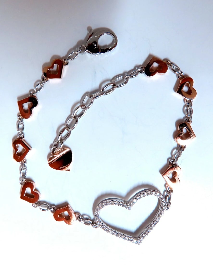 .36 carat natural diamonds wide heart linked bracelet 14 karat two tone *v: Title: .36 carat natural diamonds wide heart linked bracelet 14 karat two tone *v Description: .36 carat natural round diamonds wide heart charm link bracelet. Bracelet can be worn at adjustable setti