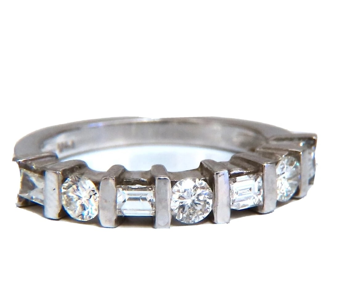 .75ct. Natural baguettes and rounds Diamond band ring 14 karat *v: Title: .75ct. Natural baguettes and rounds Diamond band ring 14 karat *v Description: .75 carat natural baguette and round diamonds channel set band. H color vs2, si1 clarity 14 karat white gold 4 gra