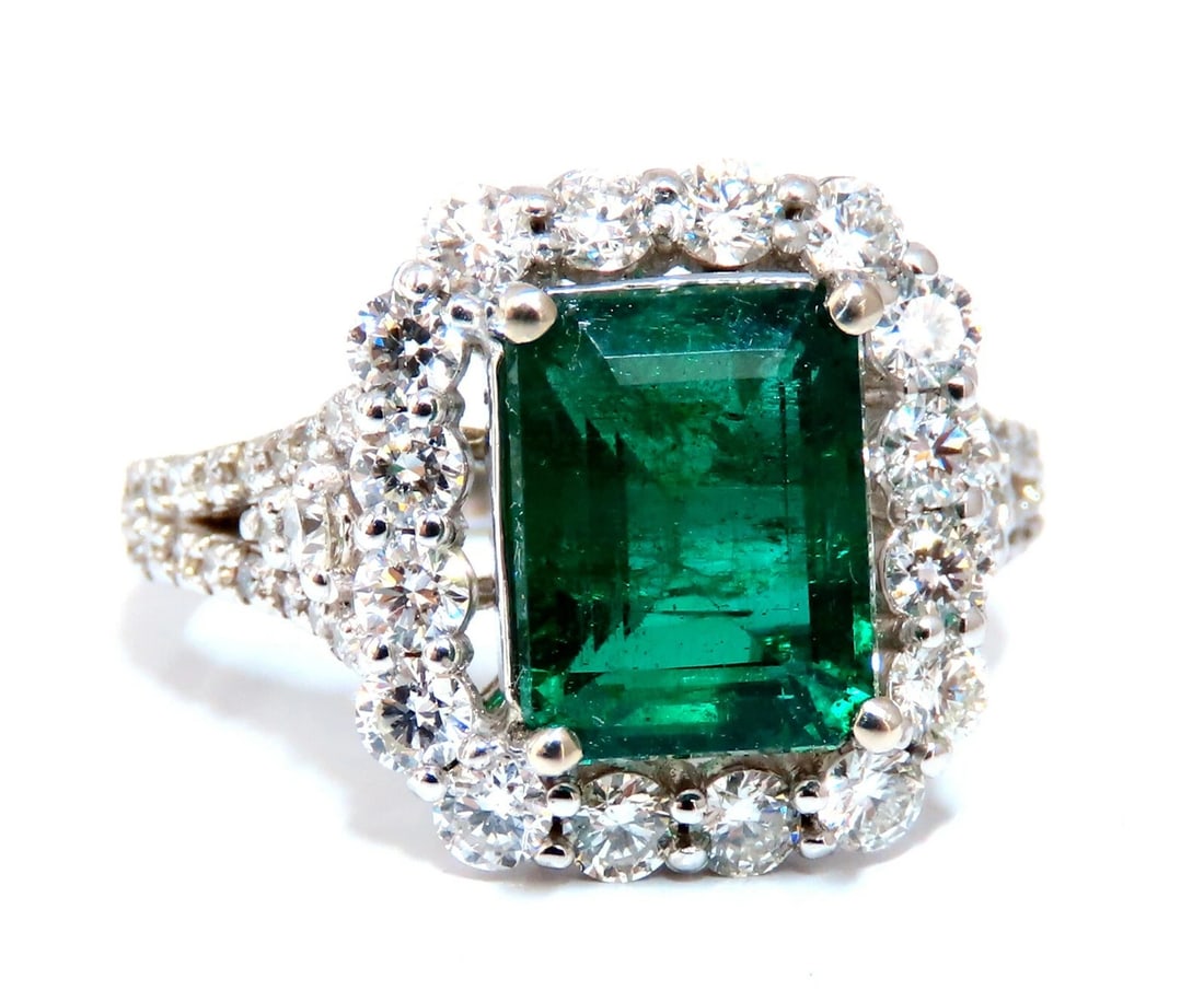 GIA Certified: 3.31ct Natural Emerald Diamonds Ring 14kt (F1) *v: Title: GIA Certified: 3.31ct Natural Emerald Diamonds Ring 14kt (F1) *v Description: Halo Green. 3.31ct. Natural Emerald Ring GIA Certified: #1333185542 (To Accompany) 9.70 X 7.46 x 5.59mm Full cut Em