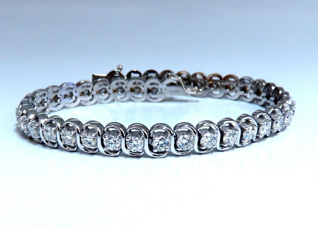 3.80ct Natural Diamonds InterLink Tennis Bracelet 14kt Gold *v: Title: 3.80ct Natural Diamonds InterLink Tennis Bracelet 14kt Gold *v Description: 3.80ct. Natural diamonds Interlink tennis bracelet. Rounds, full cut. G color Vs-2 clarity. 14k t. white gold 18.3 Gr