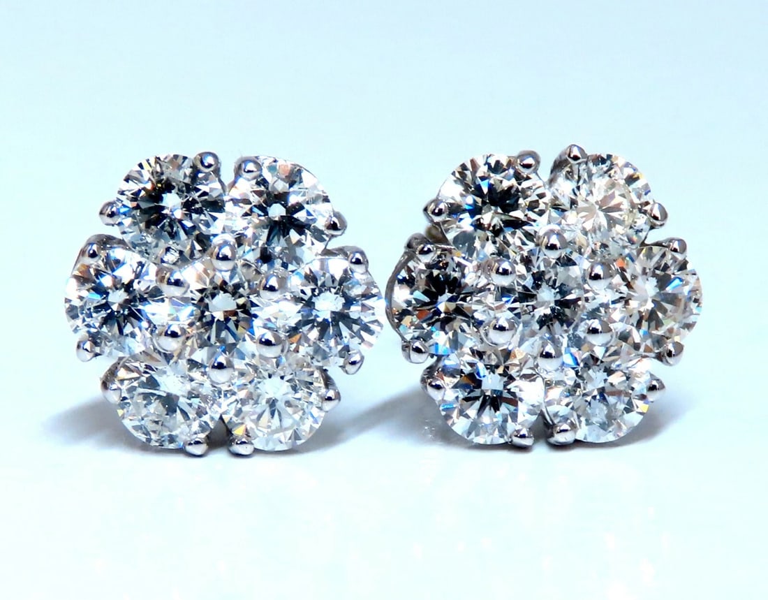 2.96ct Natural Diamonds Cluster Earrings 14kt**: Title: 2.96ct Natural Diamonds Cluster Earrings 14kt** Description: Cluster & Halo Stud Earrings. 2.96cts of natural round diamonds: G-color, Vs-2 Si-1 clarity. 14kt. white gold 3.8 grams. Earrings me