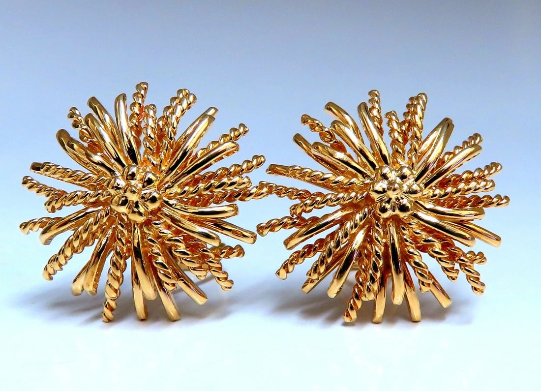 14kt Gold Blossoming Daisy 3D Clip Earrings **: Title: 14kt Gold Blossoming Daisy 3D Clip Earrings ** Description: Multi Tiered Textured 3D Daisy Clip Earrings Measurements of Earrings: 1.4 Inch Diameter Depth: .31inch Comfortable Omega Clips 20.7 