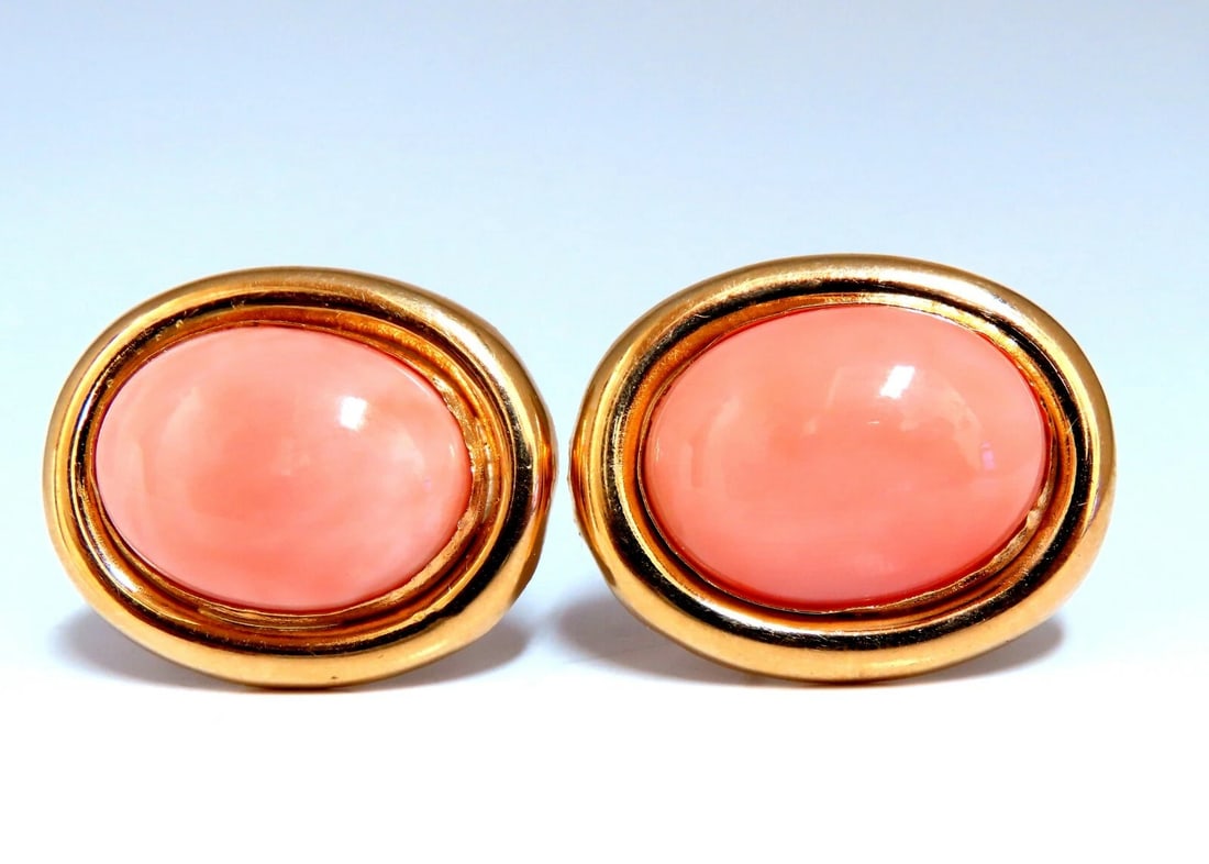 19mm Natural Coral Clip Earrings 14kt**: Title: 19mm Natural Coral Clip Earrings 14kt** Description: 19 x 15mm Natural Coral Earrings 14KT yellow gold. 12.4 grams Comfortable Omega Over all earrings diameter: 1.07 x .86 inch All Items come w