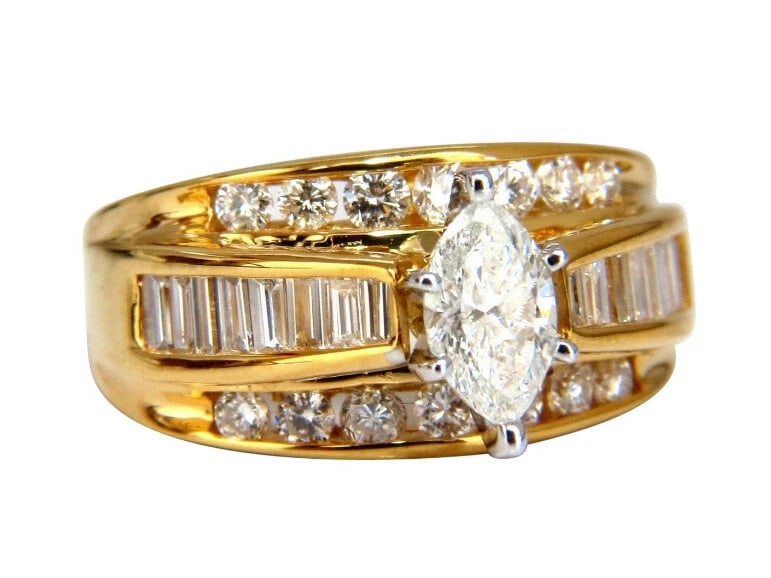 .73ct Natural Marquise Diamond Raised Cathedral Ring 14kt *v: Title: .73ct Natural Marquise Diamond Raised Cathedral Ring 14kt *v Description: Marquise Cathedral .73ct. Marquise diamond Ring I-color, Si-2 clarity .80ct Side baguette & .70 round diamonds: G-H-col