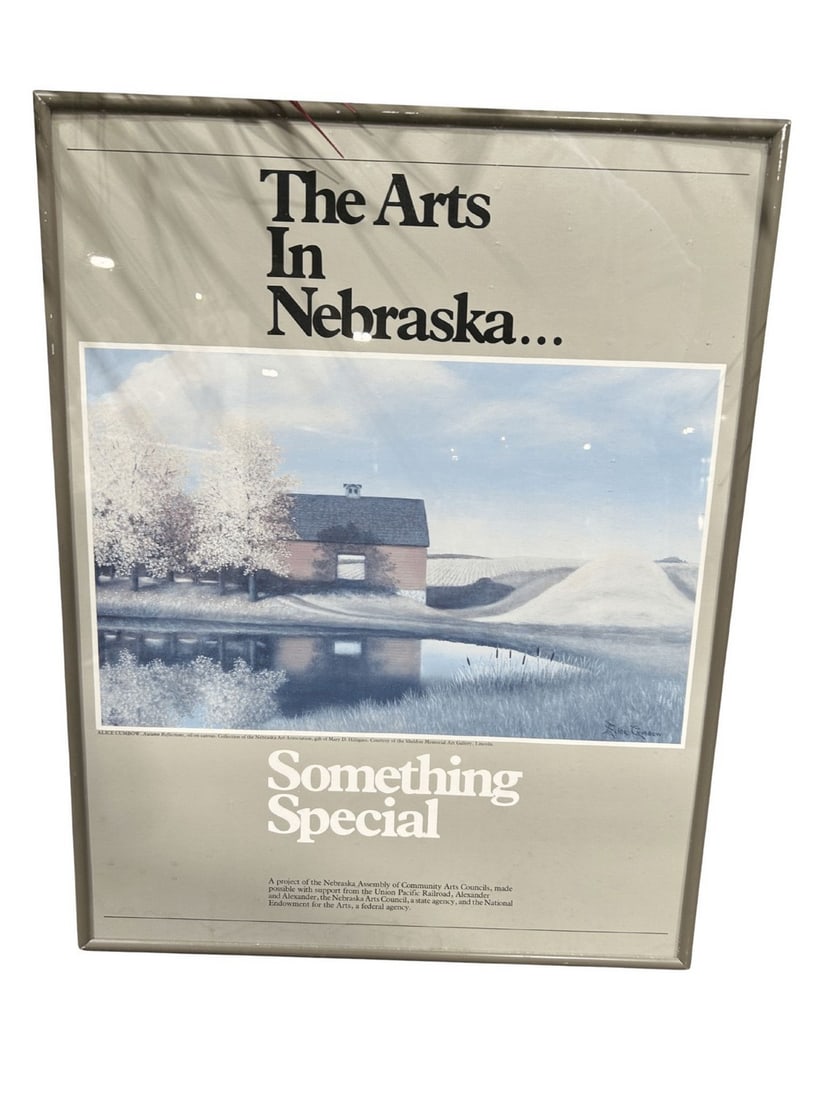 "Autumn Reflections" by Alice Cumbow, Framed Exhibition Poster for "The Arts In Nebraska...Someth...: This auction lot features a framed exhibition poster for "The Arts In Nebraska...Something Special," showcasing Alice Cumbow's "Autumn Reflections," an oil on canvas painting. The poster features a