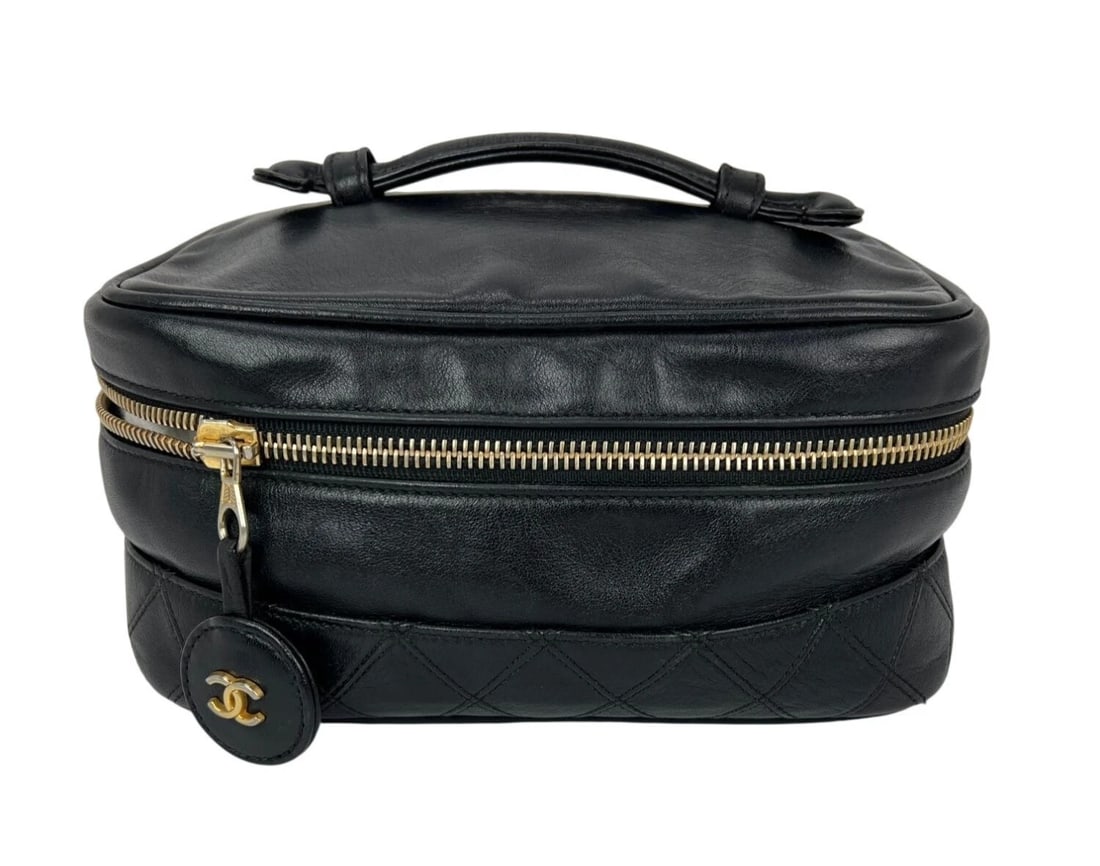 Chanel Lambskin Vanity Cosmetic Case Black: Title: Chanel Lambskin Vanity Cosmetic Case Black Description: Pre-Owned 100% Authentic Chanel Lambskin Vanity Cosmetic Case Black Vintage 24K plated RATING: B...Very Good, well maintained, shows mino