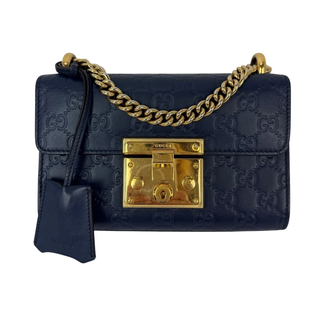 Gucci GG Supreme Small Padlock Monogram Blue Leather Shoulder Bag: Title: Gucci GG Supreme Small Padlock Monogram Blue Leather Shoulder Bag Description: Pre-Owned 100% Authentic Gucci GG Supreme Small Padlock Monogram Blue Leather Shoulder Bag RATING: B...Very Good,