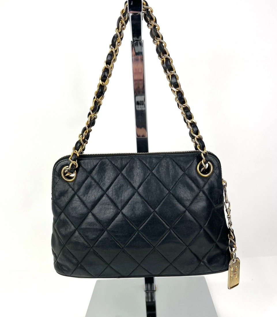 CHANEL Quilted Lambskin Leather Vintage 24K Black Mini Shoulder Bag: Title: CHANEL Quilted Lambskin Leather Vintage 24K Black Mini Shoulder Bag Description: Pre-Owned 100% Authentic CHANEL Bag Quilted Lambskin Leather Chain Vintage Black Mini Shoulder Bag RATING: B/C..